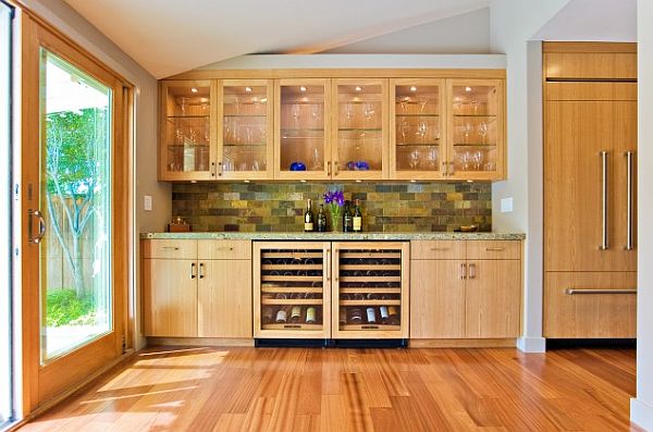 built-in with wine storage and custom cabinets in wooden kitchen with hardwood floors