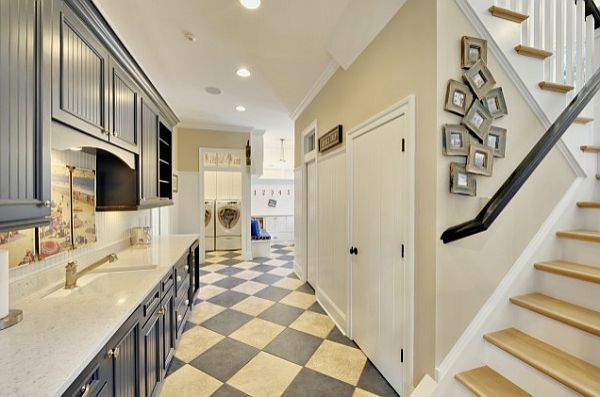 checkered flooring hall with open kitchen design