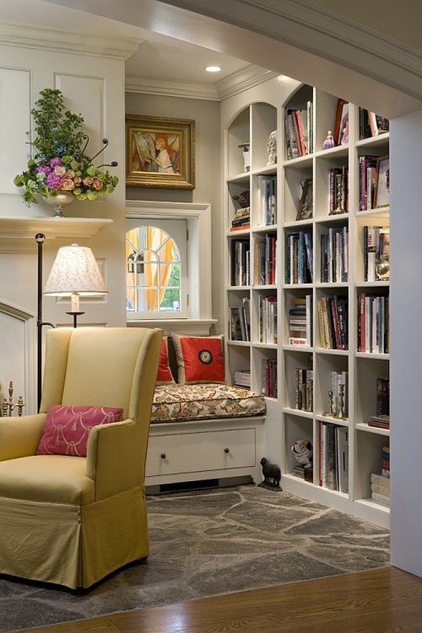 colorful reading nook with pillows and big bookcase