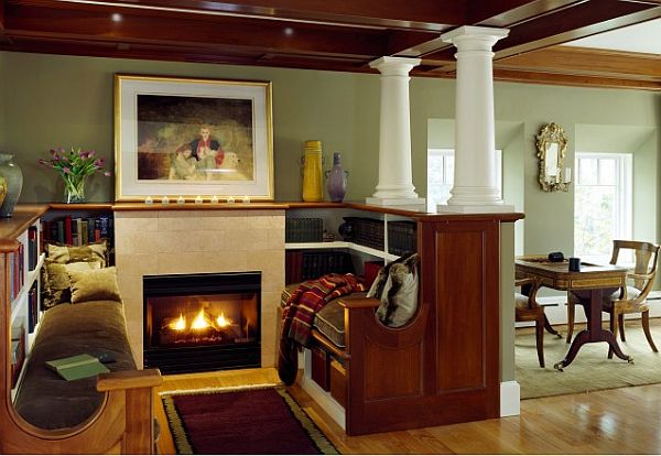 cozy reading nook with bookcase and fireplace