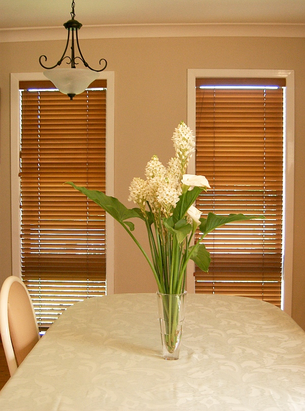 floor to ceiling wooden blinds