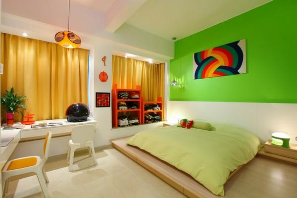 green modern bedroom with rainbow art