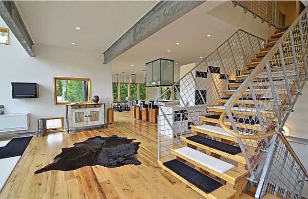 industrial mineappolis loft with fancy wooden beam staircase