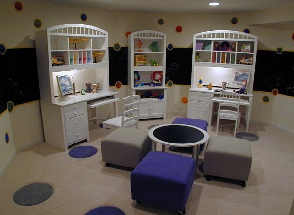 kids area room with white desks and colorful wallpaper
