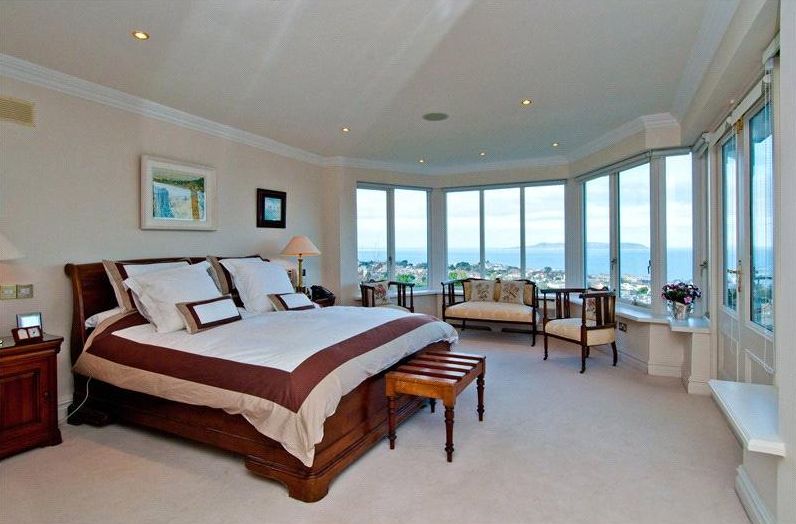 large bedroom with sea view