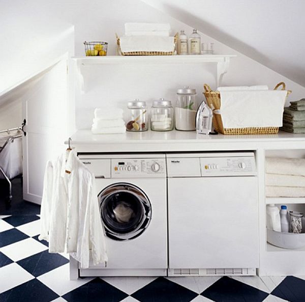 laundry room with black and white tiled flooring
