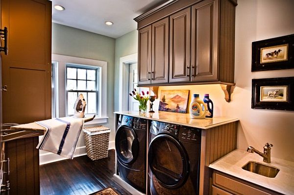 laundry-room-with-fold-down-ironing-board-folding-top-washer-dryer-built-in-wood-floors-laundry-sink-marble-tops-bead-board