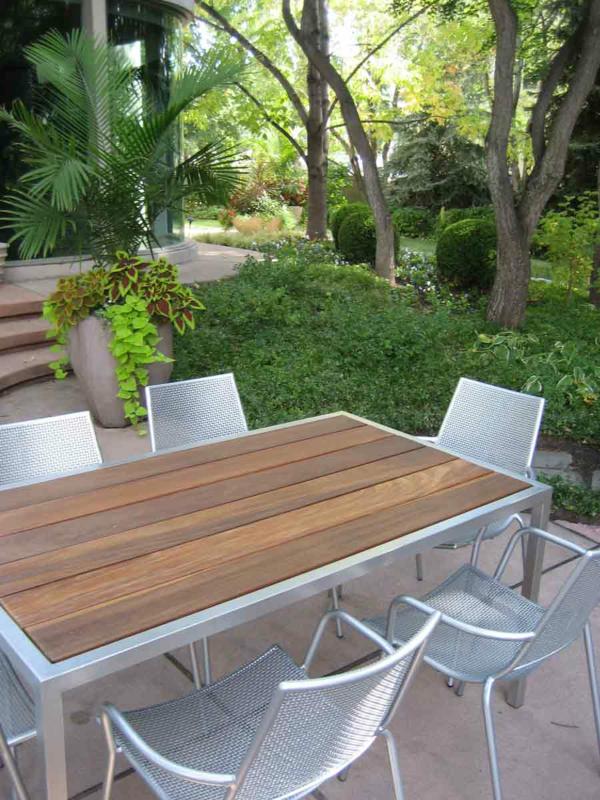 modern cement planter and round boxwood