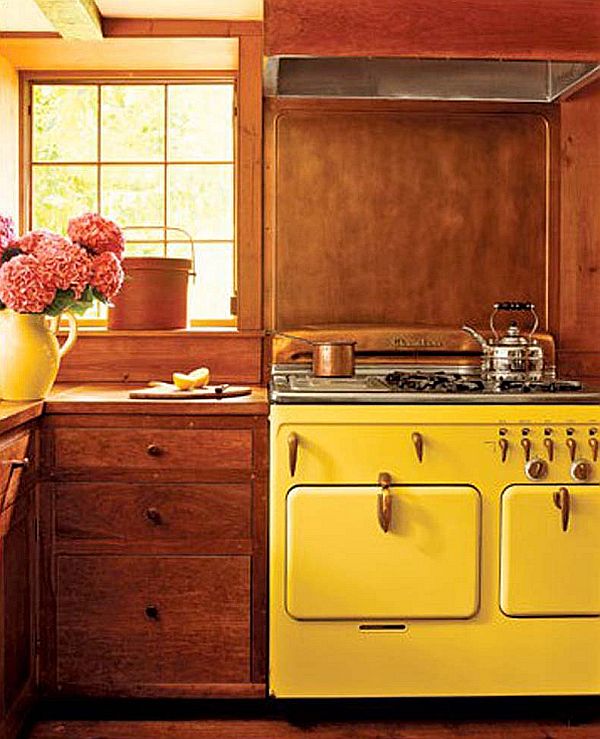 orange wood kitchen with yellow vintage appliances