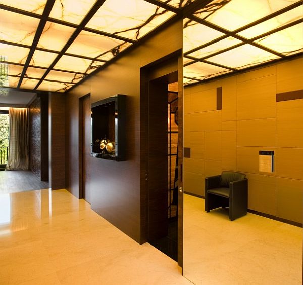 posh entrance hall decor ideas with big mirrors on walls