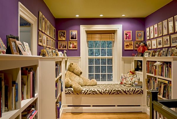 purple and white kids room with large bookcase