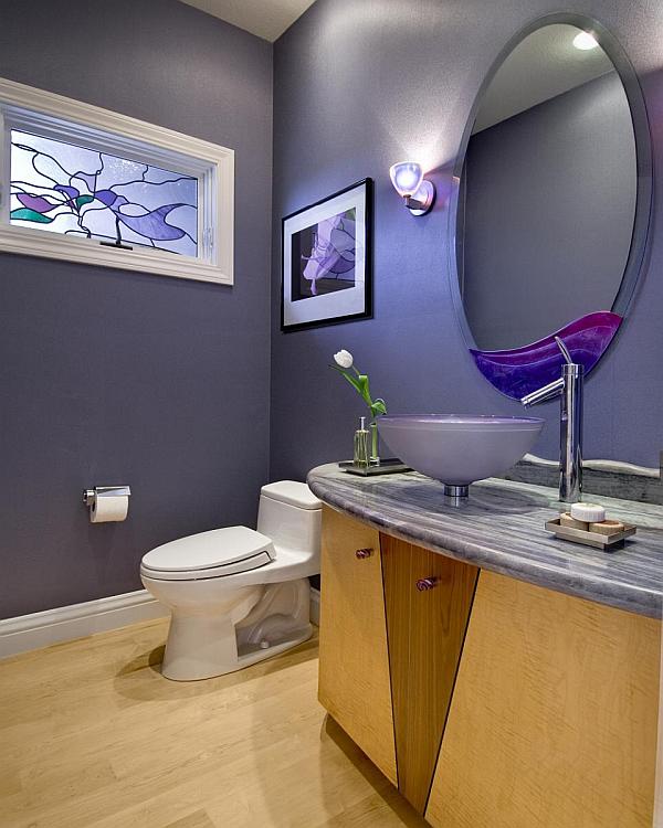 purple powder room with colorful art glass window