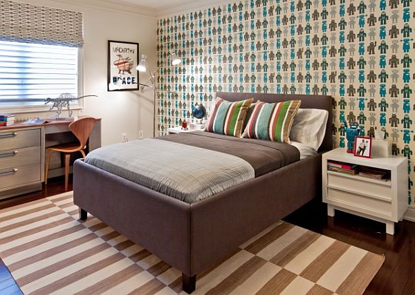 teen-boys-bedroom-with-patterned-wallpaper-and-bed-coverings