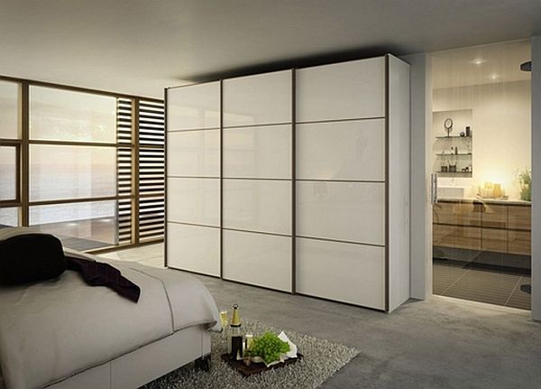 white and grey bedroom with white wardrobe with sliding doors