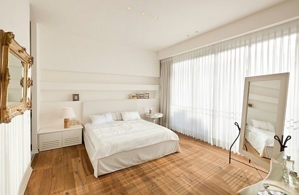 white-bedroom-design-with-windows-shades-protecting-the-floor