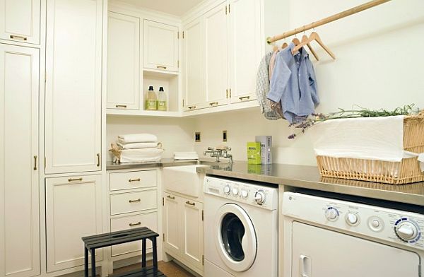 white laundry room with vertical storage solutions