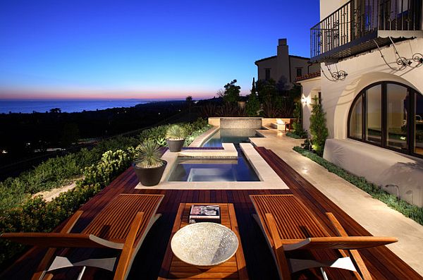 wood and stone creating the pool area