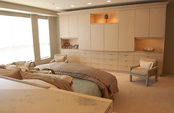 Gorgeous-master-bedroom-with-custom-wall-of-wardrobes