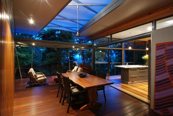 HP Tree House - dining room with wood walls and wood floors