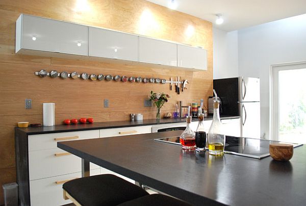 Magnetic racks on the wooden kitchen wall