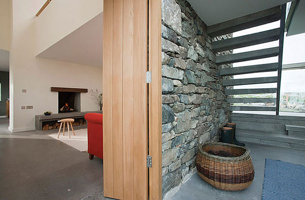 Modern Stone Hut - cottage fireplace and stone walls