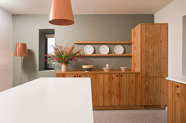 Modern Stone Hut - white kitchen island