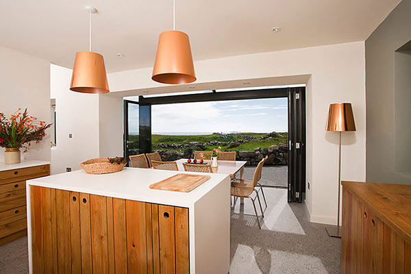 Modern-Stone-Hut-white-kitchen-with-wood-accents