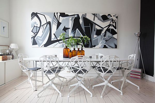 White dining room with big graffiti wall art