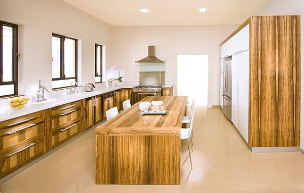 Wooden kitchen furniture with island doubling up as kitchen table