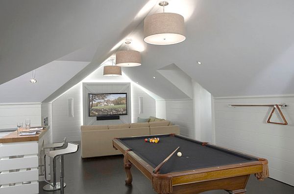 attic redecoration into gaming room with backlit television wall