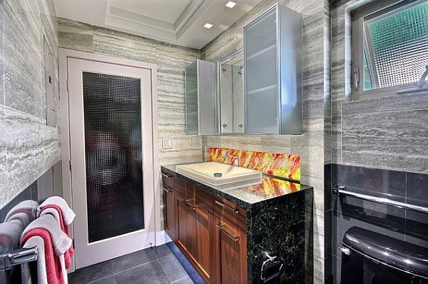 bathroom with vein-cut silver travertine, cast glass & LED lighting