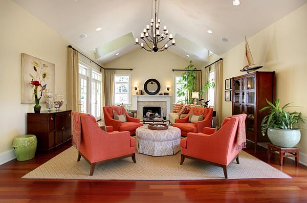 beautiful living room with shades of coral chairs