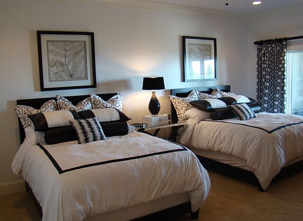 black and white guest room with twin beds