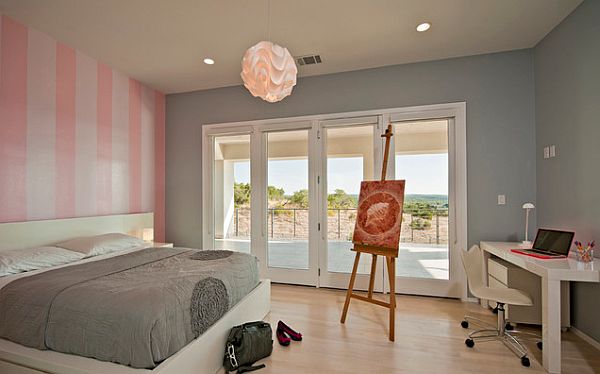 grey bedroom with pink striped wallpaper