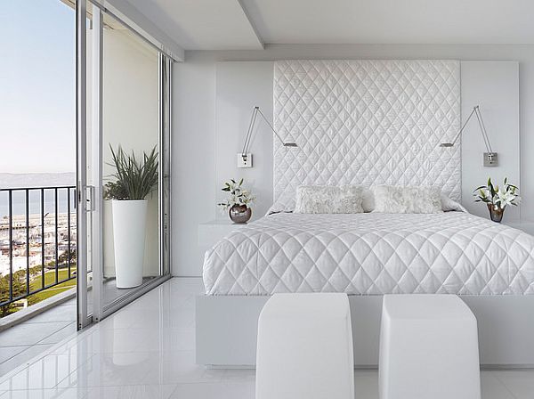 white-bedroom-with-white-flooring-Bed-quilt-and-head-board