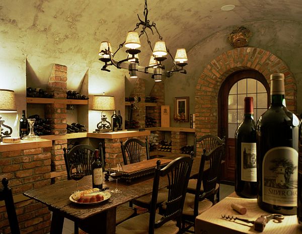 wine cellar with a table and rounded ceiling