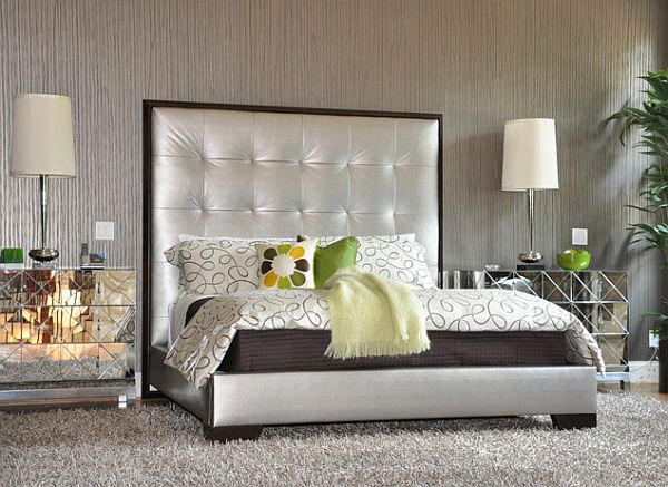 70s design - silver upholstered bed with mirrored nightstands and a gray shag rug