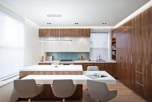 Kitchen with  walnut-veneered cabinetry with white furniture