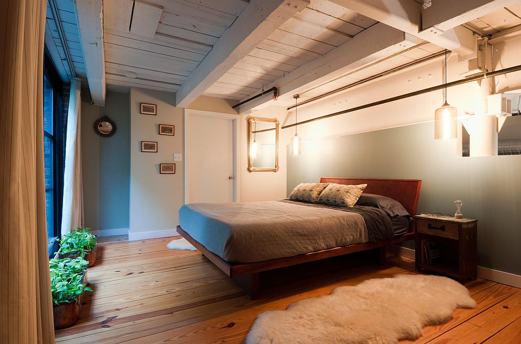 bachelor bedroom with wood flooring