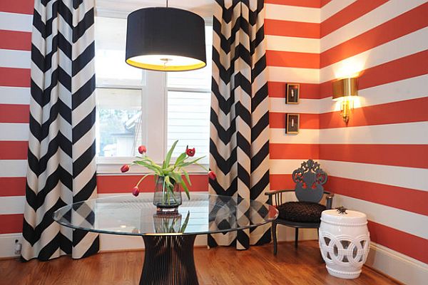 Black curtains and red wall stripes for a perfect modern match