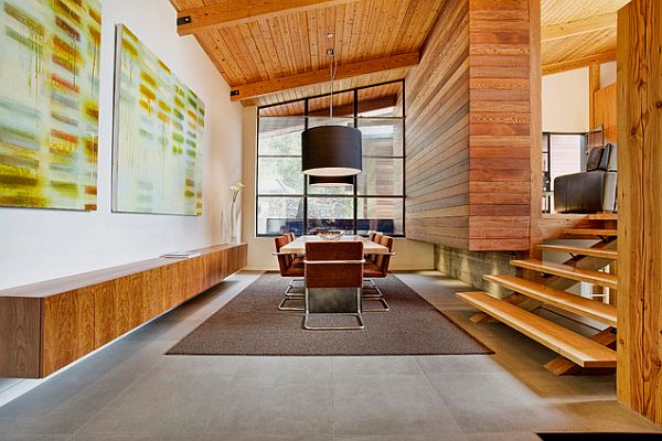 dining space with wooden walls