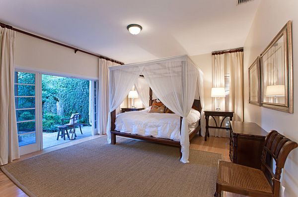 Exotic teak bedroom with solid frame canopy