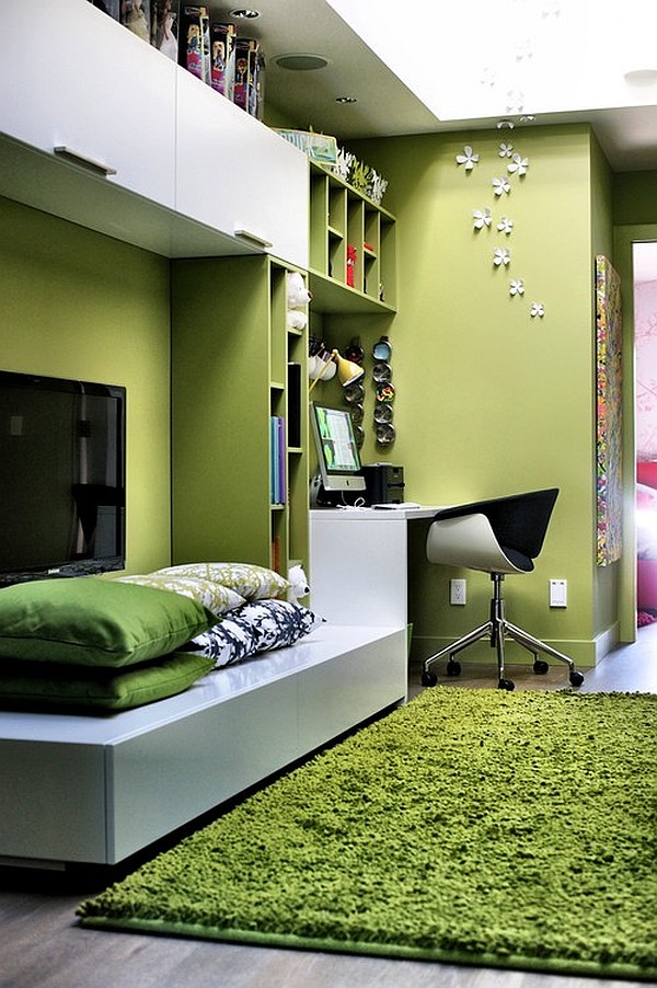 green teen bedroom with desk and fluffy carpet