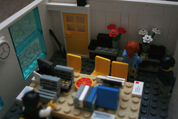 miniature Lego office - Yard Digital - pizza on office desk