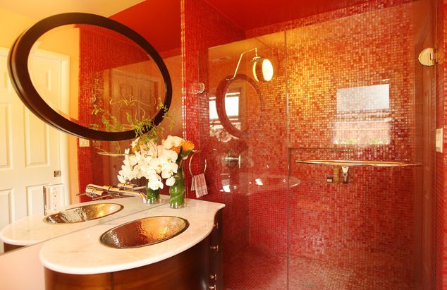 red bathroom design with red glass tile, marble and walnut vanity