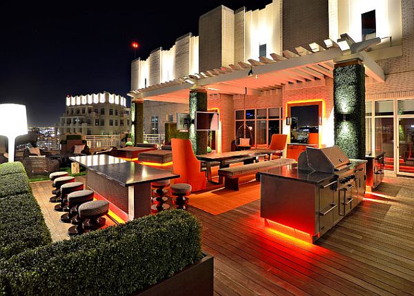 rooftop-terrace-with-glowing-neon-furniture-and-small-garden