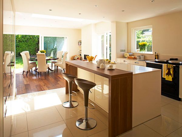 sleek open space kitchen and dining room with kitchen accents