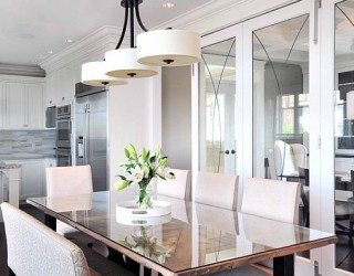 white themed dining room with modern hanging lamp