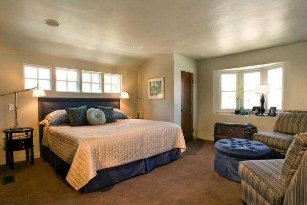 A comfy guest room with seating