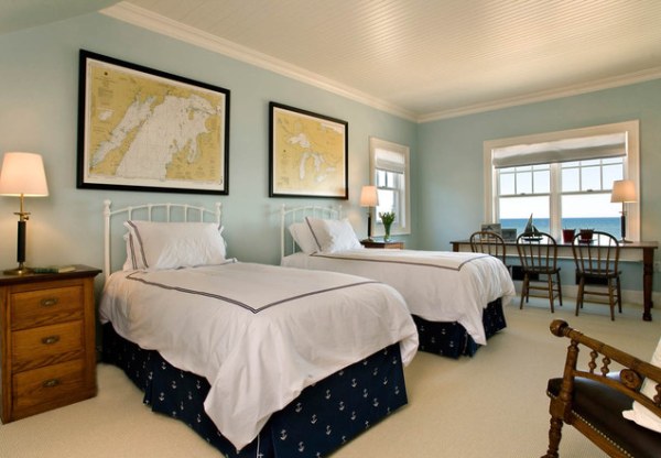 A nautical guest room with two beds